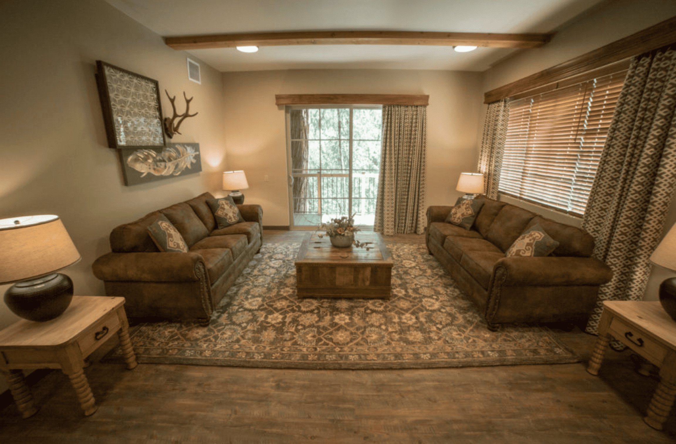 living room with two couches parallel to each other with a coffee table in the middle